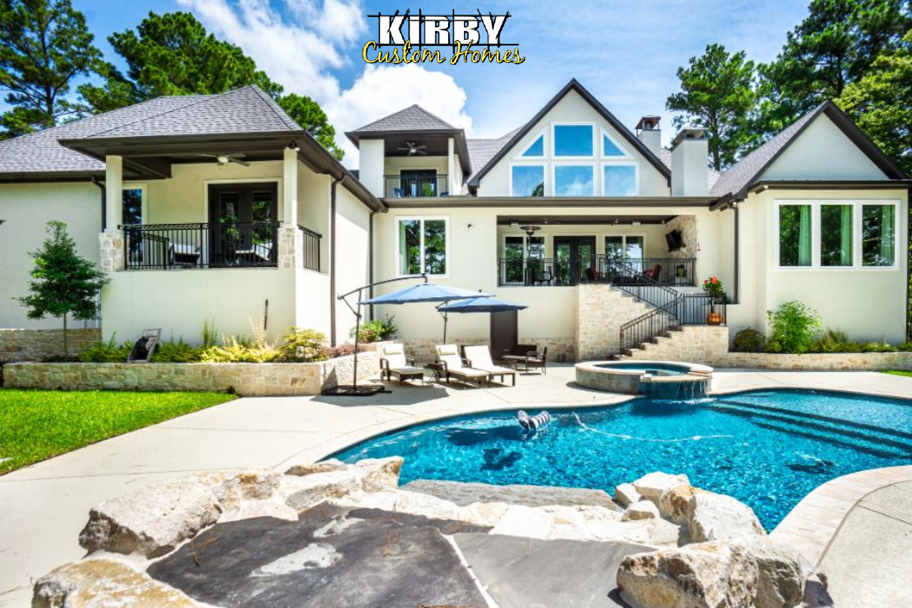 Pool and patio at a Kirby Custom Homes build in The Cascades